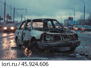 Totaled car sitting on road after accident involving multiple vehicles. Стоковое AI-изображение, AI-художник Иван Рябоконь / Фотобанк Лори