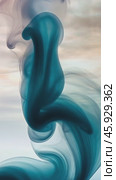 Teal and grey ink evolving in water with a pastel background. Стоковое AI-видео, аниматор Юрий Поздников / Фотобанк Лори