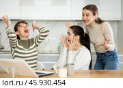 Women are sitting at computer and are immensely happy. Стоковое фото, фотограф Яков Филимонов / Фотобанк Лори