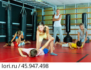 Young boys and girls on self-defence training. Стоковое фото, фотограф Яков Филимонов / Фотобанк Лори