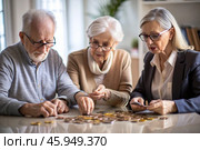Pension. Saving money. Savings. An elderly couple calculates their savings. Financial literacy. Стоковое AI-изображение, AI-художник Photojuli / Фотобанк Лори