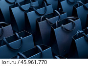Many dark blue shopping bags representing consumerism and commerce. Стоковое AI-изображение, AI-художник Иван Рябоконь / Фотобанк Лори
