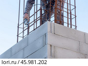 Construction site, man builder building build, metal armature concrete structure. Стоковое фото, фотограф Spirit River / Фотобанк Лори