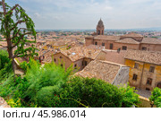 Landscape with roofs of houses in small tuscan town in province (2014 год). Стоковое фото, фотограф Олег Жуков / Фотобанк Лори