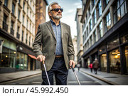 Disability. Loss of vision. A blind man with a cane and dark glasses is walking along a city street. International Day of the Blind on November 13. Стоковое AI-изображение, AI-художник Photojuli / Фотобанк Лори