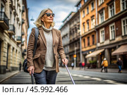 Disability. Loss of vision. A blind woman with a cane and sunglasses is walking down a city street. International Day of the Blind on November 13. Стоковое AI-изображение, AI-художник Photojuli / Фотобанк Лори