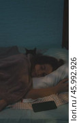 Vertical video. Sleep deprivation, insomnia issues. Woman lies awake at night. Стоковое видео, видеограф Маргарита Кирьякова / Фотобанк Лори