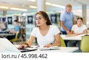 Smart female Latina student preparing for the exam. Стоковое фото, фотограф Яков Филимонов / Фотобанк Лори