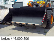 Russia. Samara, August 22, 2024: new construction equipment on the trading platform near the store on a sunny summer day. Text in Russian: gidroremservis. Редакционное фото, фотограф Акиньшин Владимир / Фотобанк Лори