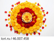 Beautiful and colorful flower rangoli decoration for diwali festival with a yellow rose in the center. Стоковое AI-изображение, AI-художник Иван Рябоконь / Фотобанк Лори
