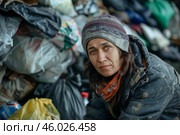 Homeless woman searching for food in garbage dumpster. Стоковое AI-изображение, AI-художник Иван Рябоконь / Фотобанк Лори