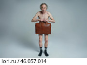 Naked man stands and covers himself with a briefcase. Стоковое AI-изображение, AI-художник Дмитрий Киселёв / Фотобанк Лори