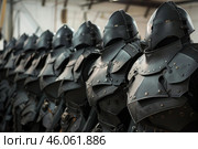 Medieval armor suits standing in a row in workshop. Стоковое AI-изображение, AI-художник Иван Рябоконь / Фотобанк Лори