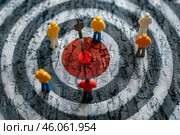 Target audience and marketing strategy planning with miniature figurines. Стоковое AI-изображение, AI-художник Иван Рябоконь / Фотобанк Лори