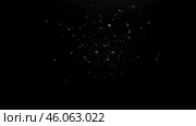 Floating dust particles in air, dark background overlay, small white specks, soft blurry bokeh, abstract motion texture, glowing atmospheric effect, scattered tiny dots. Стоковое фото, фотограф Павел Муравьев / Фотобанк Лори