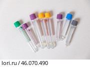 Top view vacuum venipuncture test tubes for blood samples isolated on a while background. Medical treatment, laboratory concept. Стоковое фото, фотограф Ирина Михайличенко / Фотобанк Лори