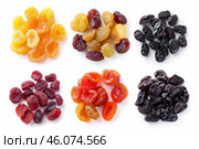 Colorful dried fruits displayed on white background, offering variety and healthy snacking options. Стоковое AI-изображение, AI-художник Иван Рябоконь / Фотобанк Лори