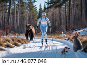 Молодая стройная спортсменка в облегающем спортивном костюме на лыжне приветствует лесных зверей под ясным зимним небом. На проталинах растут грибы и ягоды. Стоковое AI-изображение, AI-художник Сергей Никифоров-Гордеев / Фотобанк Лори
