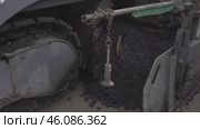 Road construction, asphalt laying, black mixture, equipment строительство дороги, укладка асфальта, черная смесь, техника. Стоковое видео, видеограф Опока Алексей / Фотобанк Лори