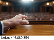 Close up of male hand pointing finger at audience in conference hall. Стоковое AI-изображение, AI-художник Евгений Харитонов / Фотобанк Лори