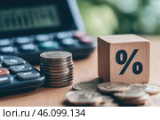 Tax season Taxation. Percent sign on wooden block, calculator, coins stack. Paperwork, financial research, report. Calculate tax return. Personal banking. Finance. Planning budget. Calculating expense. Стоковое AI-изображение, AI-художник Марина Демидюк / Фотобанк Лори