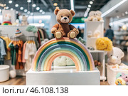 Beautiful colorful showcase of a children's store with a rainbow and a teddy bear. The concept of shopping and shopping for children's goods. Стоковое AI-изображение, AI-художник Photojuli / Фотобанк Лори