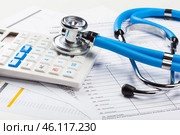 Health care costs. Stethoscope and calculator. Стоковое фото, фотограф Сергей Толмачёв / Фотобанк Лори