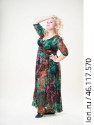 Plus size fashion model, fat woman on beige background, overweight female body. Стоковое фото, фотограф Станислав Тарко / Фотобанк Лори