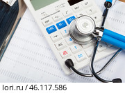 Health care costs. Stethoscope and calculator. Стоковое фото, фотограф Сергей Толмачёв / Фотобанк Лори