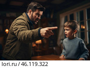 A father sternly lectures his son while seated at a wooden table in a cozy, dimly lit living room during evening hours. Стоковое AI-изображение, AI-художник Sergey Grishin / Фотобанк Лори