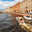 Petersburg city landscape with a river sink and walking boats (2023 год). Редакционное фото, фотограф Владимир Ушаров / Фотобанк Лори
