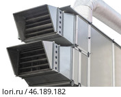 Вентиляционная труба или воздуховод. Large industrial shiny metal pipes on white background. Стоковое фото, фотограф Татьяна Д / Фотобанк Лори