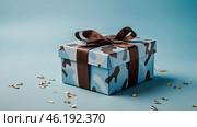 The concept of Defender of the Fatherland Day on February 23. Gift camouflage box with a festive satin ribbon bow on a light blue background. Стоковое AI-изображение, AI-художник Photojuli / Фотобанк Лори