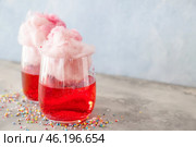 Glasses with tasty cotton candy cocktail on grunge table. Стоковое фото, фотограф Pixel_shot / Фотобанк Лори