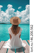 Relaxing by the turquoise sea with clouds drifting on a sunny day. Стоковое AI-изображение, AI-художник Александр Довянский / Фотобанк Лори
