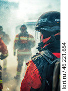 Firefighters intervening on fire, wearing protective gear and helmet. Стоковое AI-изображение, AI-художник Юрий Поздников / Фотобанк Лори