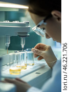 Scientist adding reagent during medical research using laboratory equipment. Стоковое AI-изображение, AI-художник Юрий Поздников / Фотобанк Лори