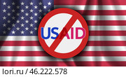 Vector round prohibitory sign with inscription USAID, on background of national wavy flag of United States of America. Ban of organization. Стоковая иллюстрация, иллюстратор GAlexS / Фотобанк Лори