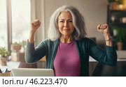 Middle aged hispanic woman with raised fist of empowerment, strength and women solidarity, International Womens Day concept. Стоковое AI-изображение, AI-художник Анастасия Золотницкая / Фотобанк Лори