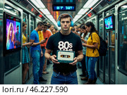 В современный вагон метро с LED-экранами и пассажирами в яркой модной одежде стоит юноша с ретро-кассетным плеером, наушниками на голове и в футболке с надписью «80-s Hits» Стоковое AI-изображение, AI-художник Сергей Никифоров-Гордеев / Фотобанк Лори