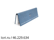Diary in blue leather cover isolated on white background. Inscription in Russian "Directorate of the President of the Russian Federation" Стоковое фото, фотограф Елена  Попкова / Фотобанк Лори