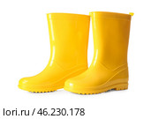 Pair of yellow rubber boots on white background. Стоковое фото, фотограф Pixel_shot / Фотобанк Лори