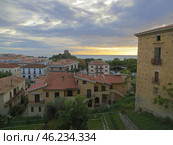 Scalea, Italy. November 20, 2024. Calabria. Scalea old city, historical center.Talao Tower on the background of sunset over the sea. Редакционное фото, фотограф Мария Фетисова / Фотобанк Лори