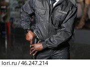 African-American security guard working in building. Стоковое фото, фотограф Pixel_shot / Фотобанк Лори