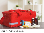 First aid kit on table in clinic. Стоковое фото, фотограф Pixel_shot / Фотобанк Лори