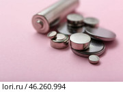 Different batteries on pink background, closeup. Стоковое фото, фотограф Pixel_shot / Фотобанк Лори