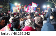Sremska Mitrovica, Serbia 15.02.2025: Supporters of Aleksandar Vucic, Serbian statesman, politician, President of the Republic of Serbia. Supporters gathered at rally waving flags and chanting slogans (2017 год). Редакционное видео, видеограф Юлия Петровская / Фотобанк Лори