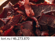 Spicy beef jerky as background. Стоковое фото, фотограф Pixel_shot / Фотобанк Лори