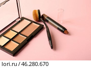 Set of cosmetics for contouring makeup on color background. Стоковое фото, фотограф Pixel_shot / Фотобанк Лори