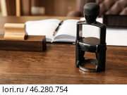 Stamp on table of notary public. Стоковое фото, фотограф Pixel_shot / Фотобанк Лори